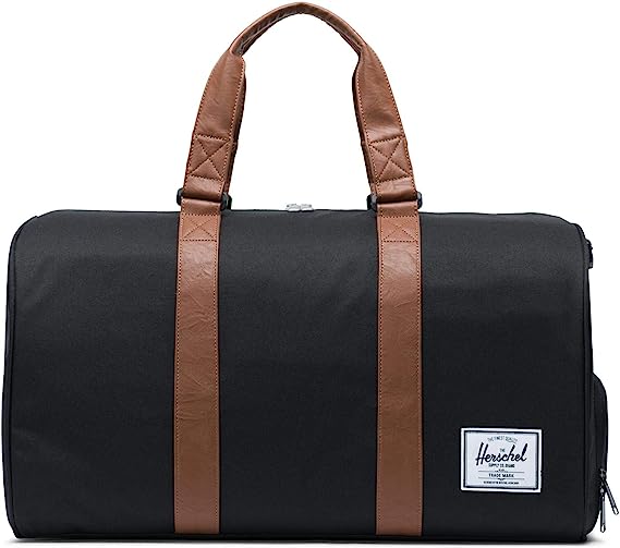 Herschel Novel Duffel Bag Black exterior with brown leather handle straps